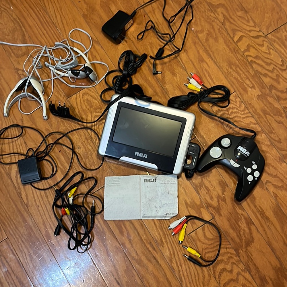 RCA Portable TV & Gaming Station with Controller and other accessories in descri